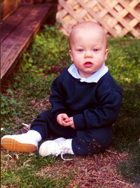 Nicholas Sitting on Lawn